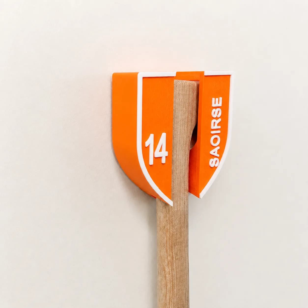 Orange & white personalised hurley wall mount with SAOIRSE · 14