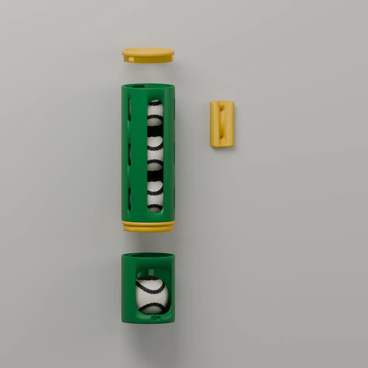 The dispenser taken apart in green with gold details: the base with a sliotar in its mouth, a 3-ball module lifted off it, the top cap above and a wall bracket